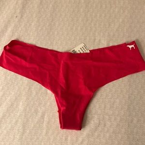 Super barely there PINK by Victoria’s Secret. Thong in red NWT.